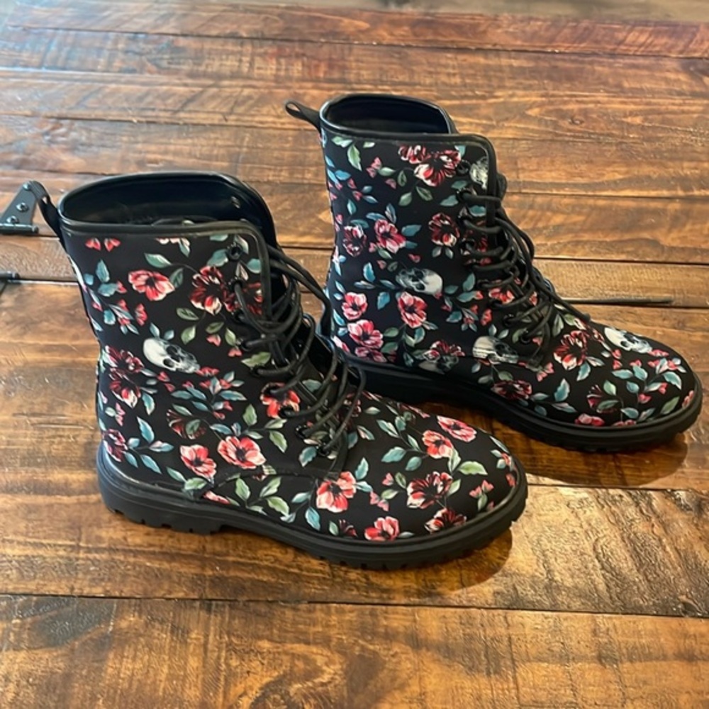 Skull and flower combat type boots.